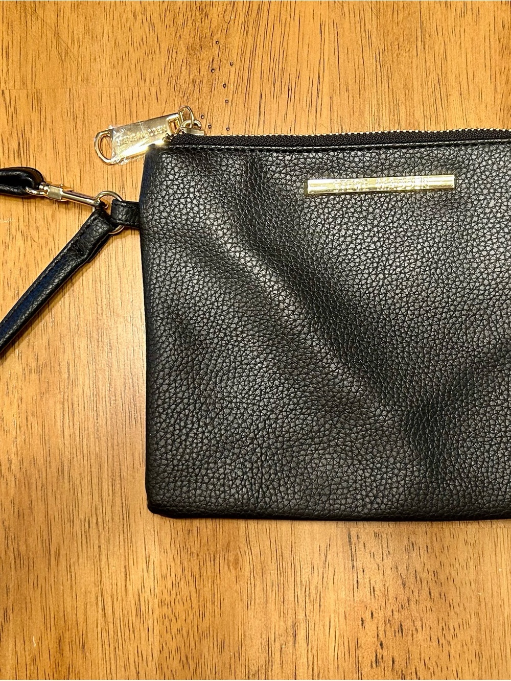 Steve Madden Black Pebbled Leather Zip Pouch with Gold Plaque